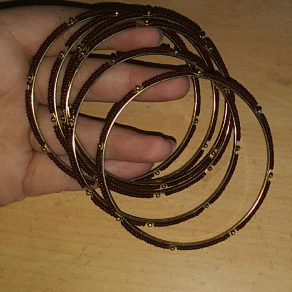 6 burgundy gold bracelets